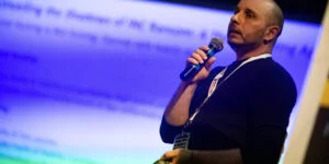 Immagini dello speech di Emanuele De Lucia, CIO Di Duskrise E Team Leader Di Cluster25 e membro del gruppo CTI di Red Hot Cyber, dal titolo "Unveiling the Shadows of INC Ransomware: A Threat Hunting Approach".