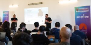 Manuel Roccon e Roberto Camerinesi del gruppo Hackerhood di RHC presentano il workshop "COME HACKERARE UNA WEB APPLICATION"