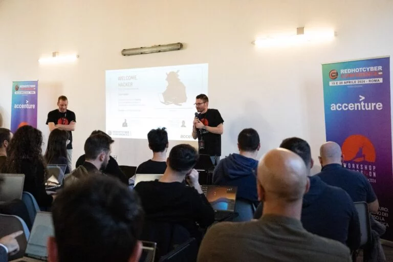 Manuel Roccon e Roberto Camerinesi del gruppo Hackerhood di RHC presentano il workshop "COME HACKERARE UNA WEB APPLICATION"