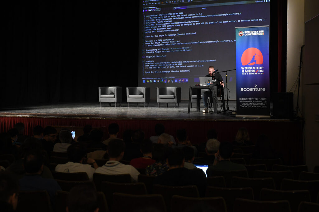 Workshop 'Come hackerare un sistema WordPress' tenuto da Manuel Roccon, ethical hacker e coordinatore del team HackerHood, all'interno dei workshop della Red Hot Cyber Conference 2025.